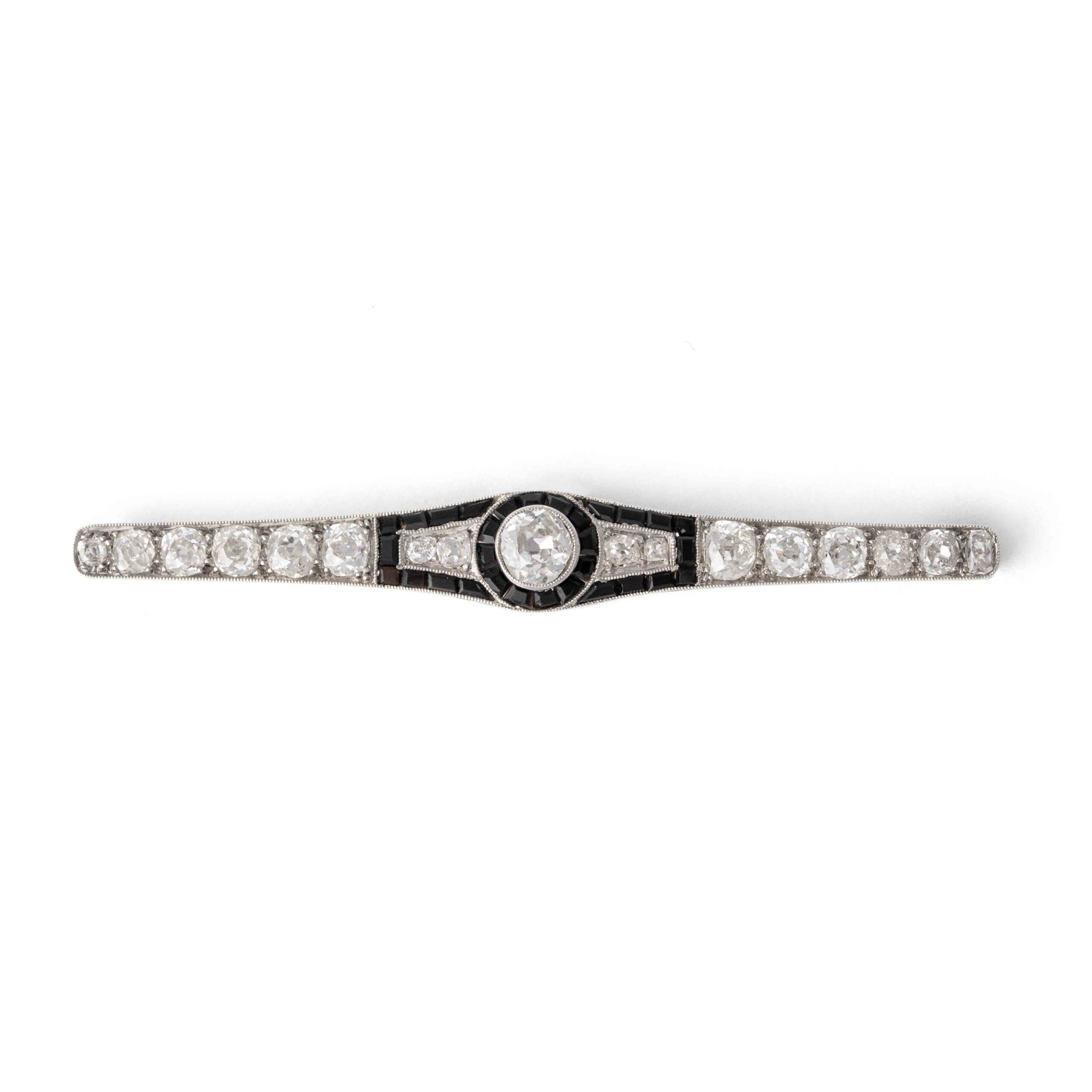 Art Deco Old mine cut Diamond and Onyx on Platinum and Gold Barrette Brooch. Circa 1930.