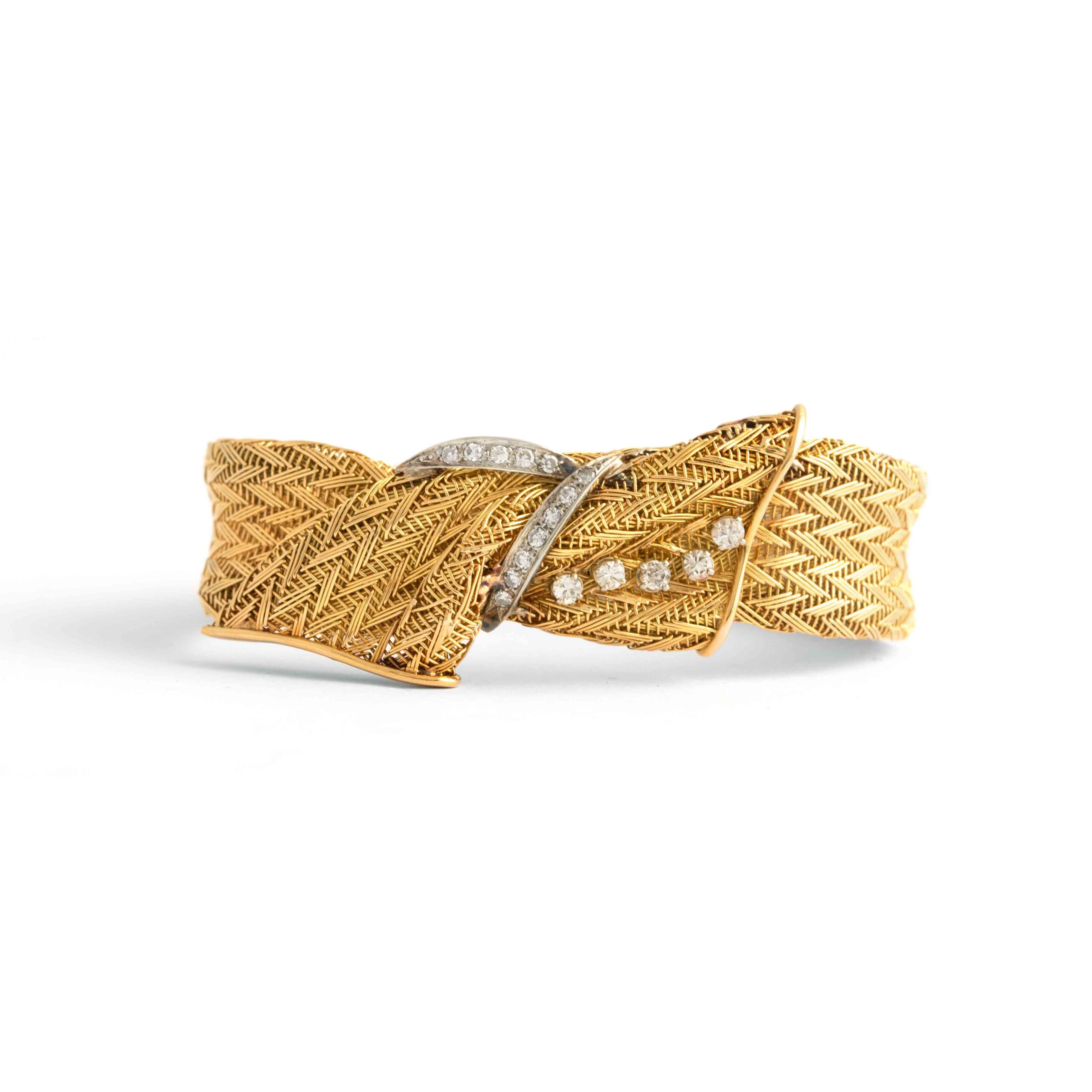 Vintage Diamond Yellow Gold 18K Bracelet. Circa 1960. set with 5 diamonds and 12 diamonds. Length