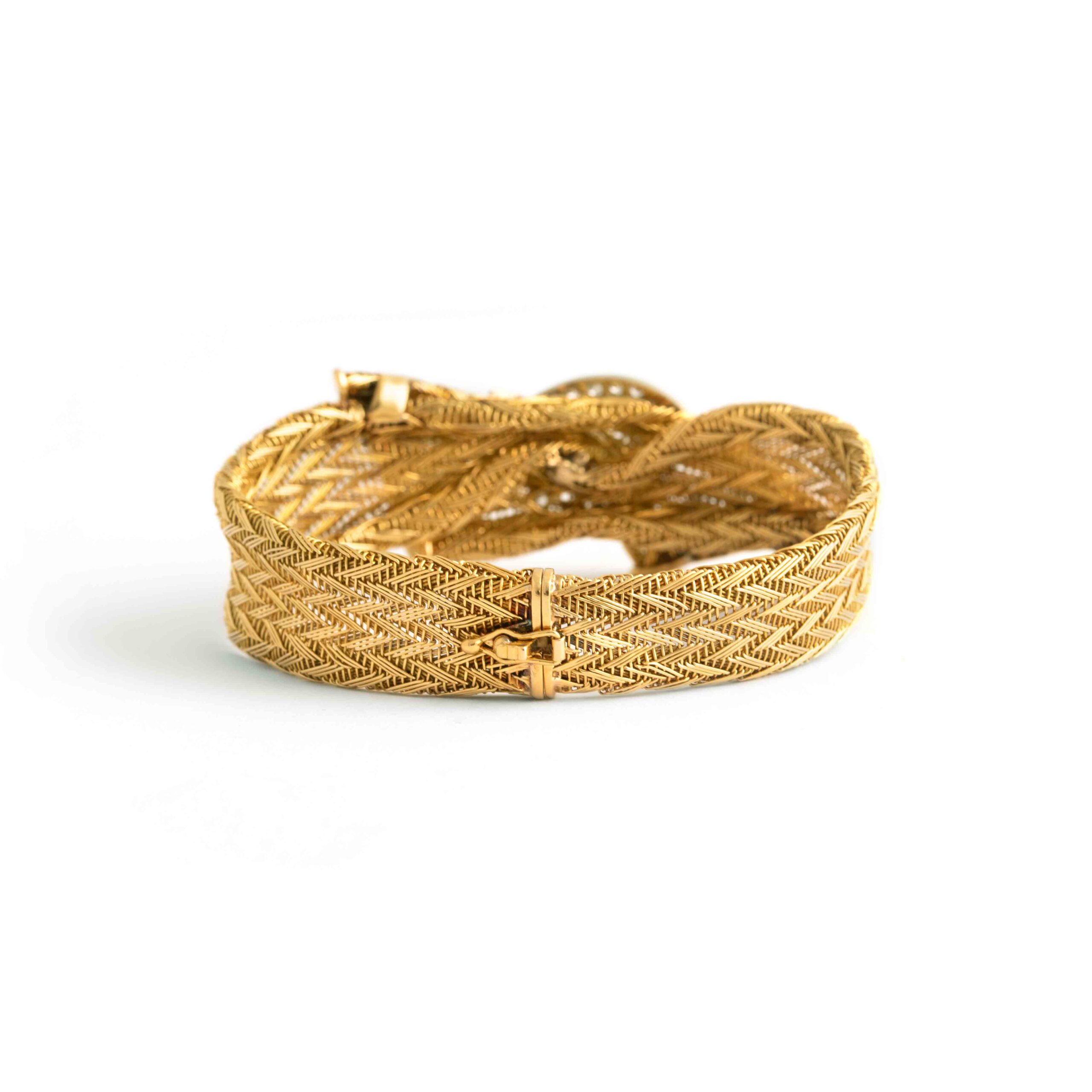 Vintage Diamond Yellow Gold 18K Bracelet. Circa 1960. set with 5 diamonds and 12 diamonds. Length