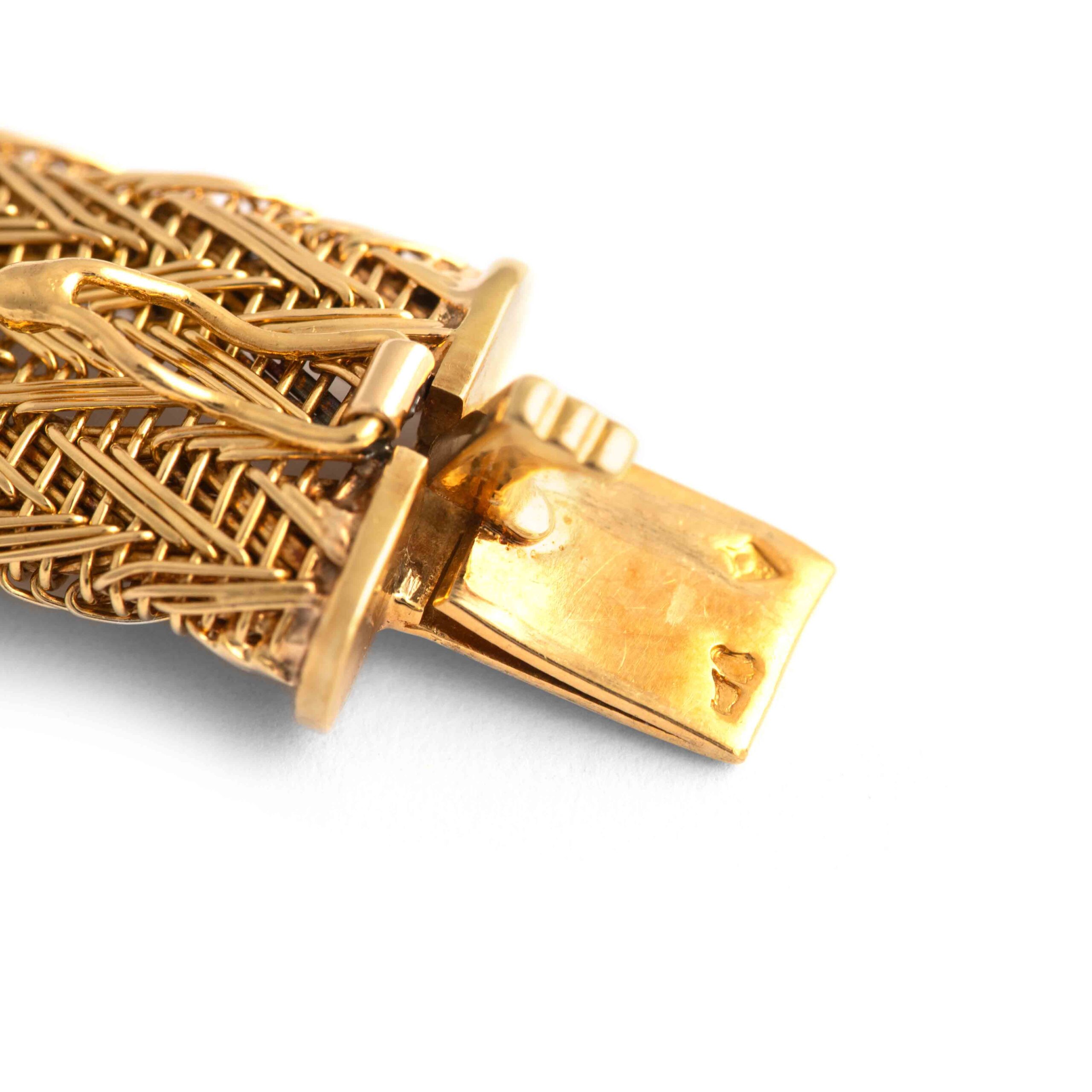 Vintage Diamond Yellow Gold 18K Bracelet. Circa 1960. set with 5 diamonds and 12 diamonds. Length