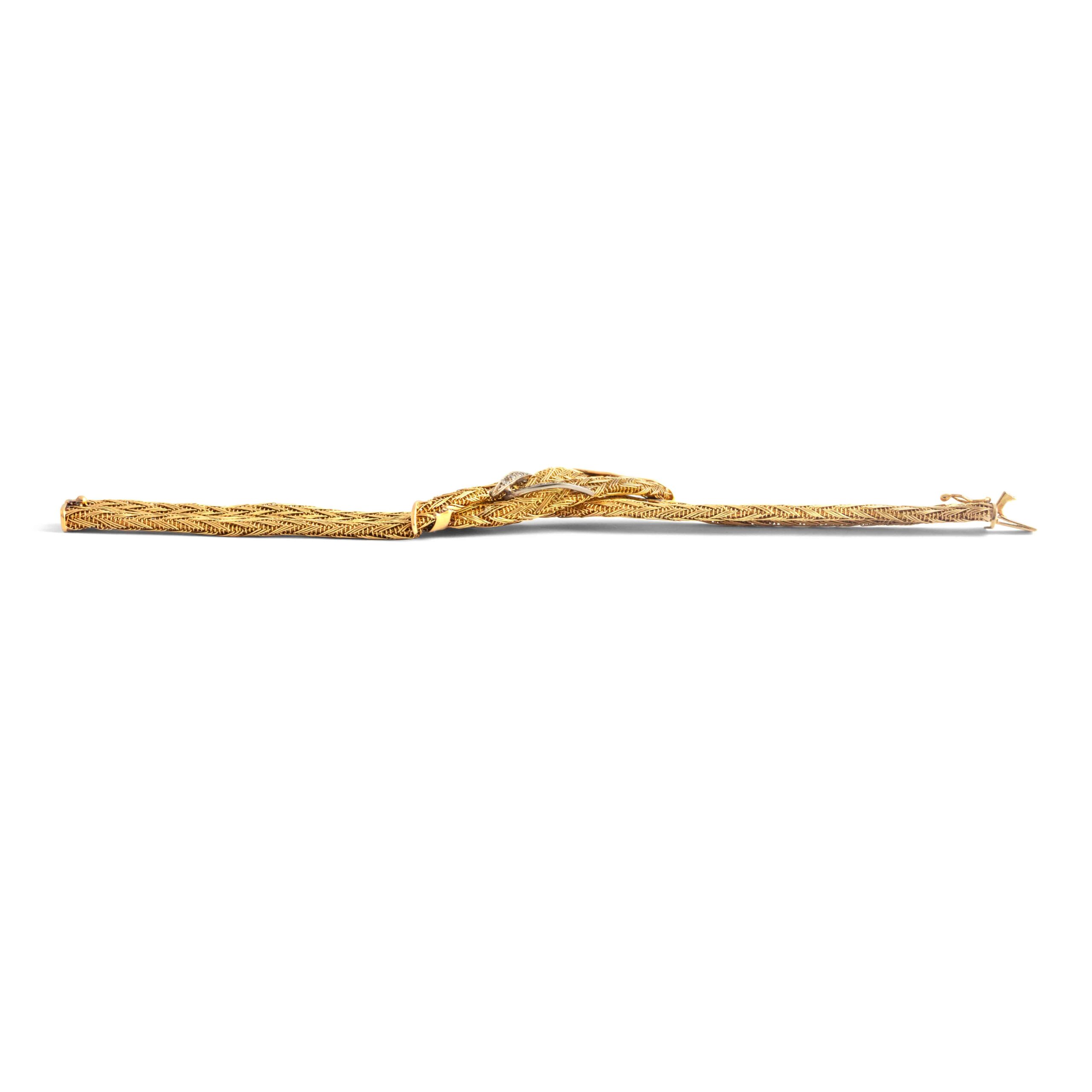 Vintage Diamond Yellow Gold 18K Bracelet. Circa 1960. set with 5 diamonds and 12 diamonds. Length