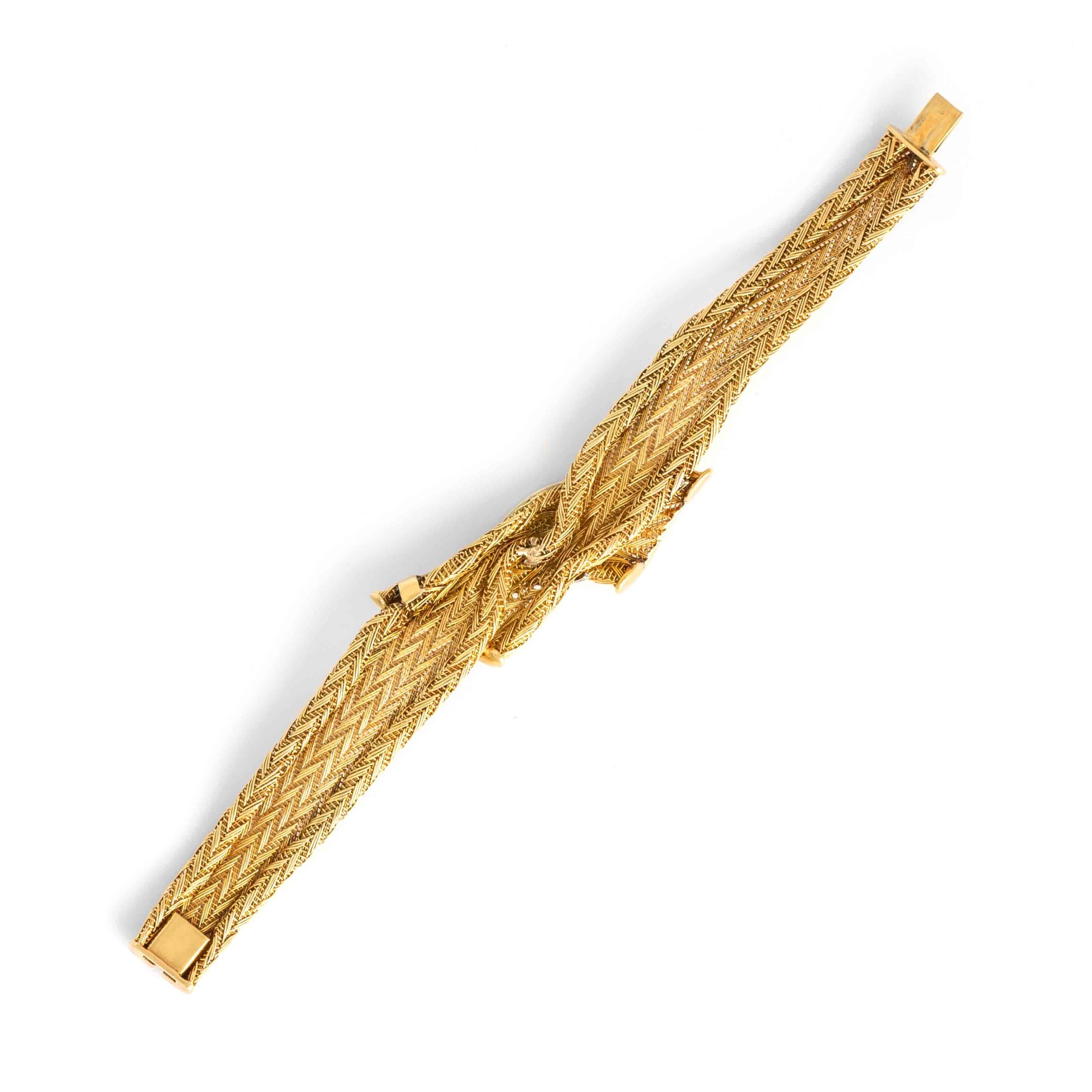 Vintage Diamond Yellow Gold 18K Bracelet. Circa 1960. set with 5 diamonds and 12 diamonds. Length