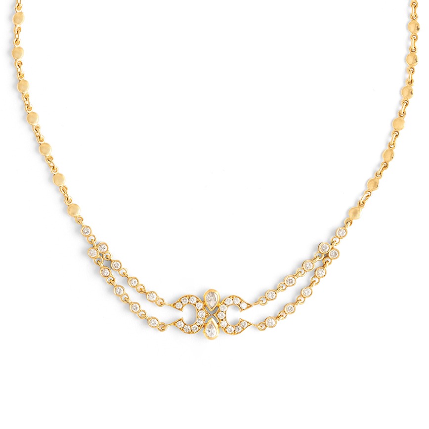 Close up and front view from the Cartier Diamond and yellow gold 18K necklace. Signed Cartier and numbered 709303. Length